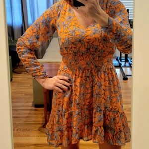 Orange dress blue flowers